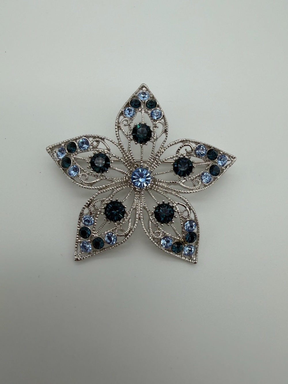 Silver Floral Brooch with Blue and Navy Crystals